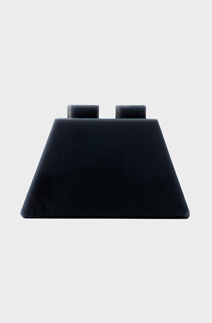 Black candle with stacking capabilities.